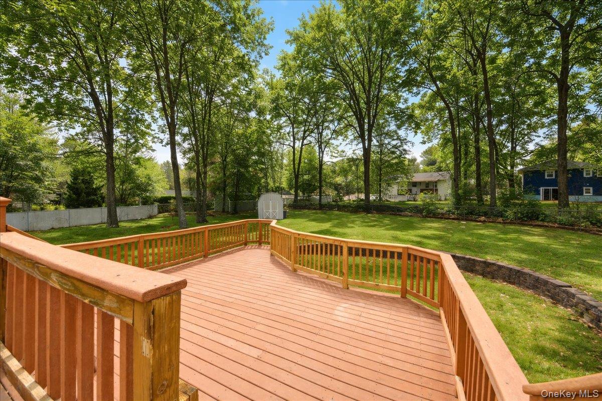 7 Gene Road Middletown, NY 10941 - Photo 38 of 43 Wooden deck featuring a shed and a fenced backyard