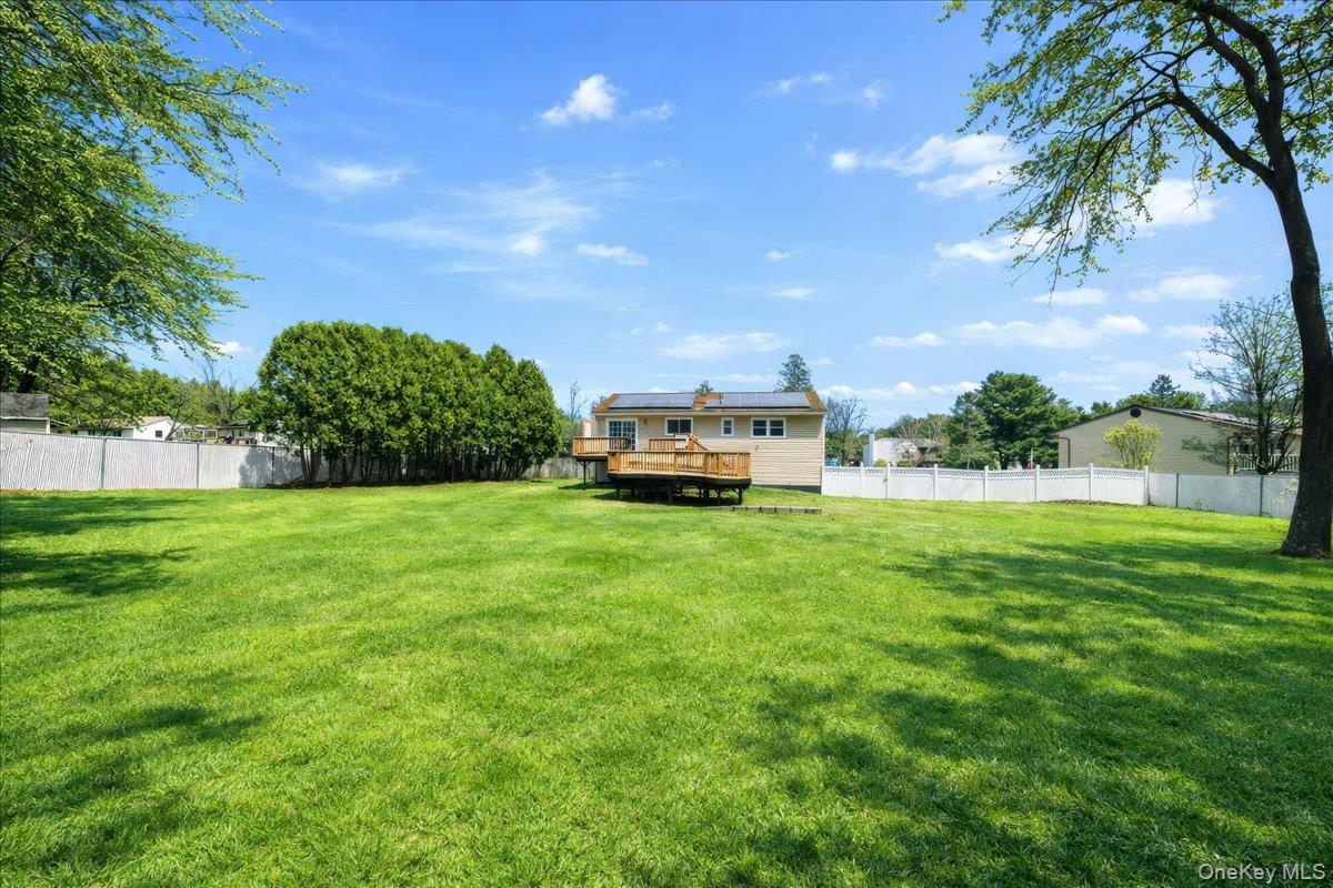 7 Gene Road Middletown, NY 10941 - Photo 39 of 43 Fenced backyard featuring a deck
