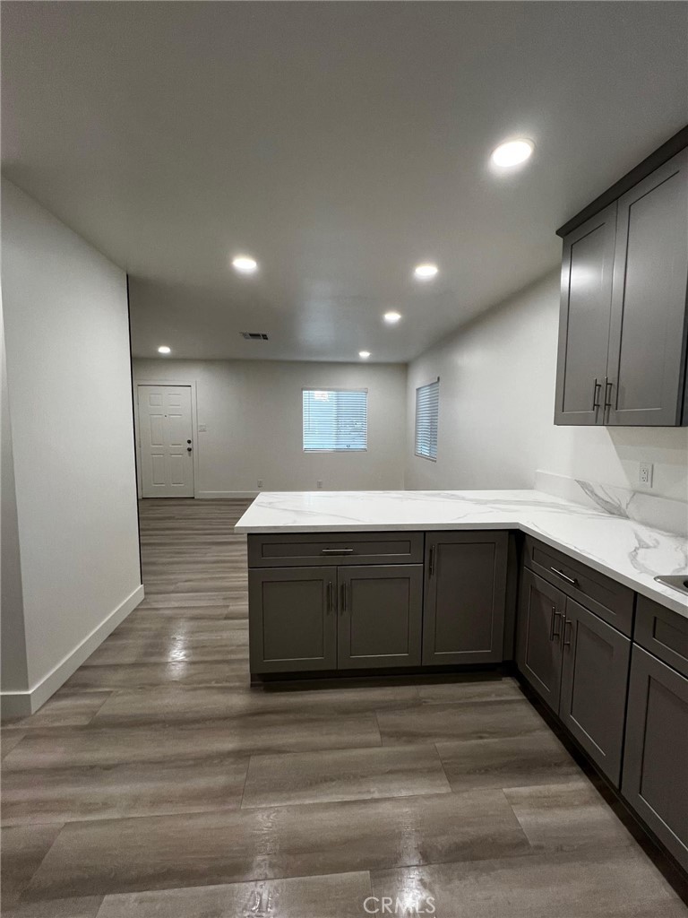 7442 Potomac Street Riverside, CA 92504 - Photo 3 of 8 a spacious bathroom with a sink and a vanity