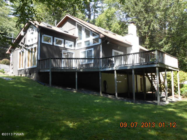 144 Raccoon Court Bushkill, PA 18324 - Photo 2 of 29 a view of a house with a yard