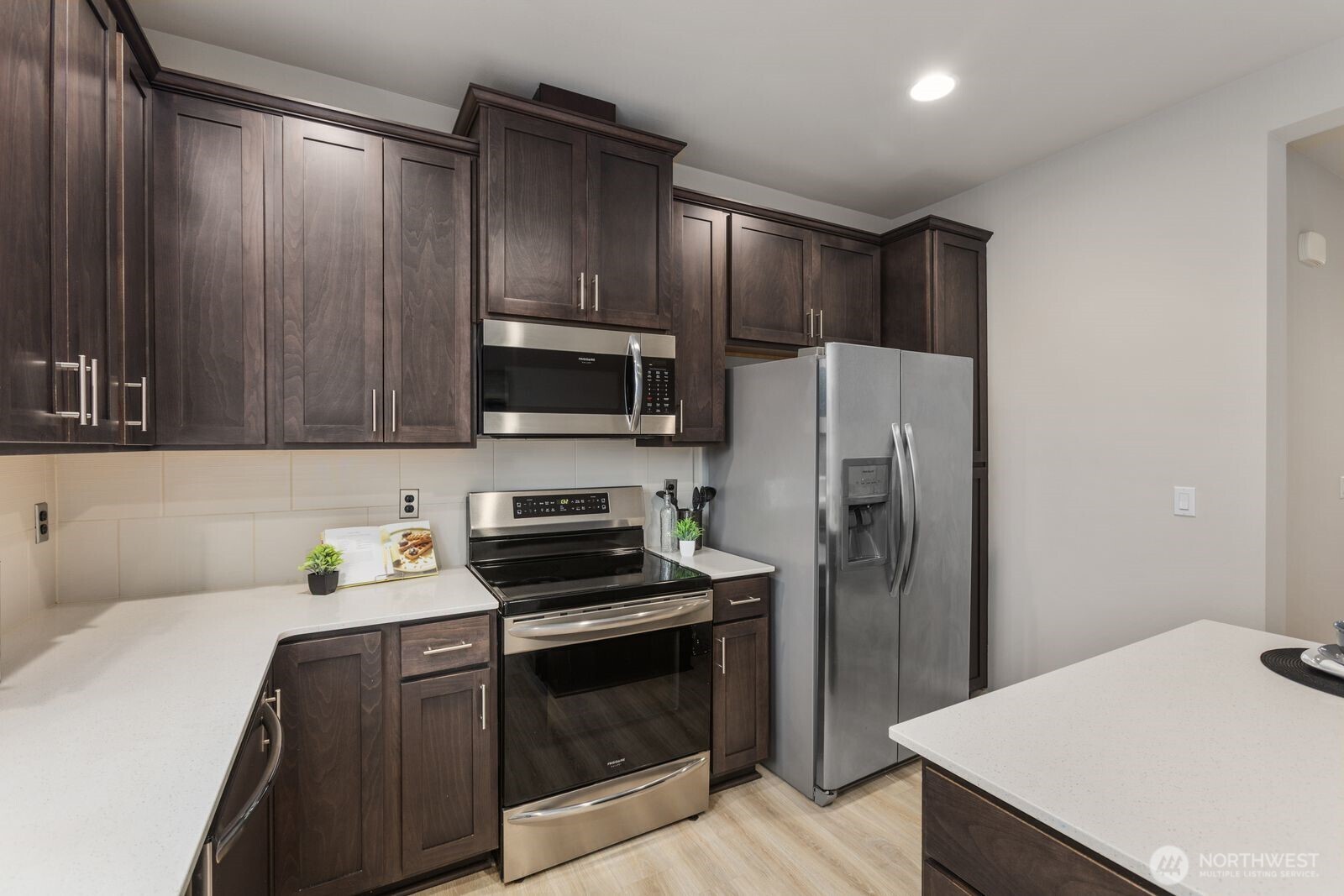 1621 Seattle Hill Road, Unit C4 Bothell, WA 98012 - Photo 14 of 35 a kitchen with stainless steel appliances a refrigerator sink and microwave