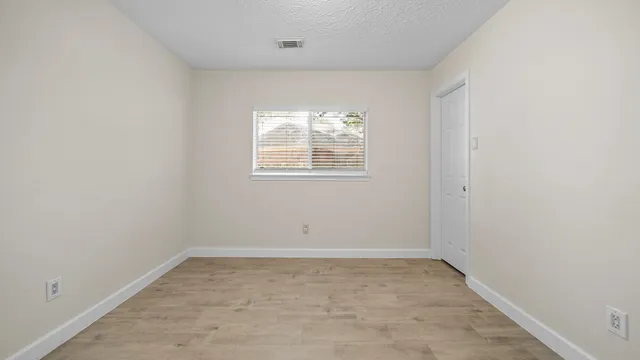 an empty room with a window