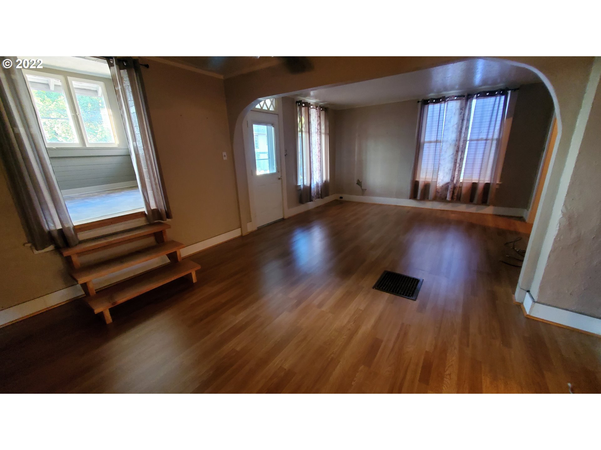 1116 Southeast Stephens Street Portland, OR 97214 - Photo 6 of 10 a black and white photo of a living room