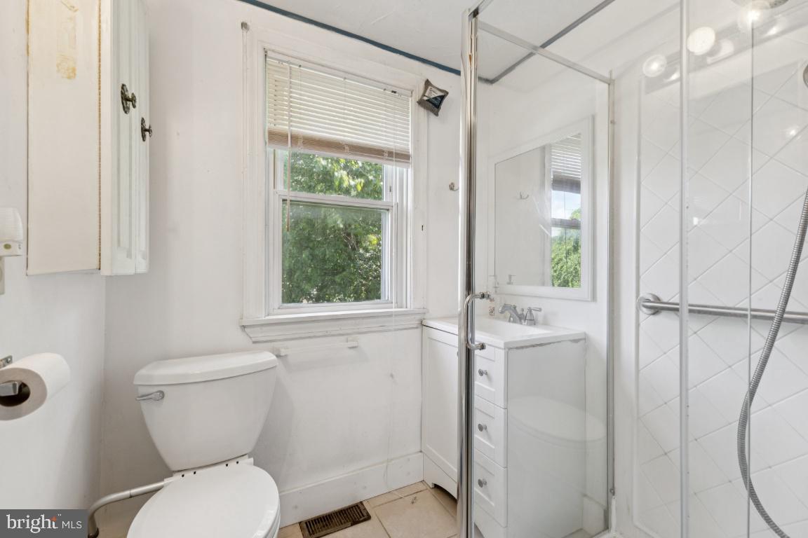 1614 Gablehammer Road Westminster, MD 21157 - Photo 11 of 32 a bathroom with a toilet and a shower