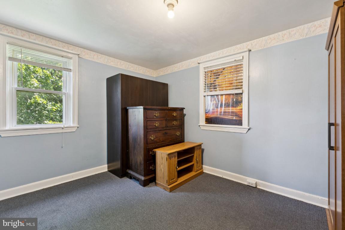 1614 Gablehammer Road Westminster, MD 21157 - Photo 20 of 32 a room with a dresser and a window