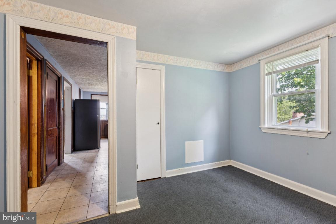 1614 Gablehammer Road Westminster, MD 21157 - Photo 21 of 32 a view of an empty room with a window
