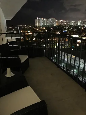 a kitchen with granite countertop a stove and a refrigerator