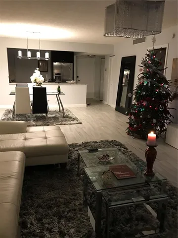 a bathroom with a sink toilet and mirror