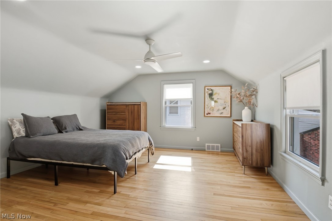 1390 Brainard Road Lyndhurst, OH 44124 - Photo 17 of 33 Bedroom featuring light wood finished floors, ceiling fan, lofted ceiling, and recessed lighting