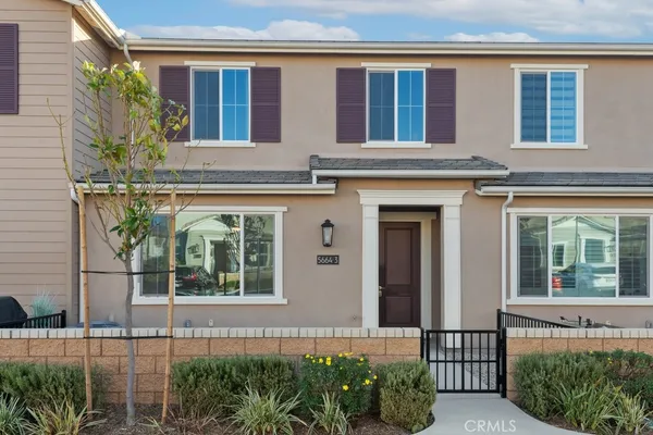 front view of a house with large windows