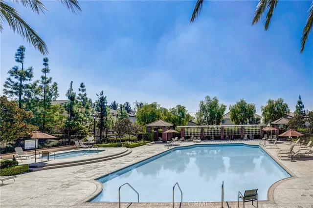 a view of a swimming pool with a patio