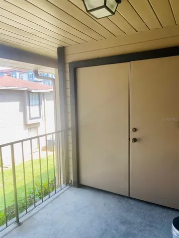 a kitchen with a table and chairs in it