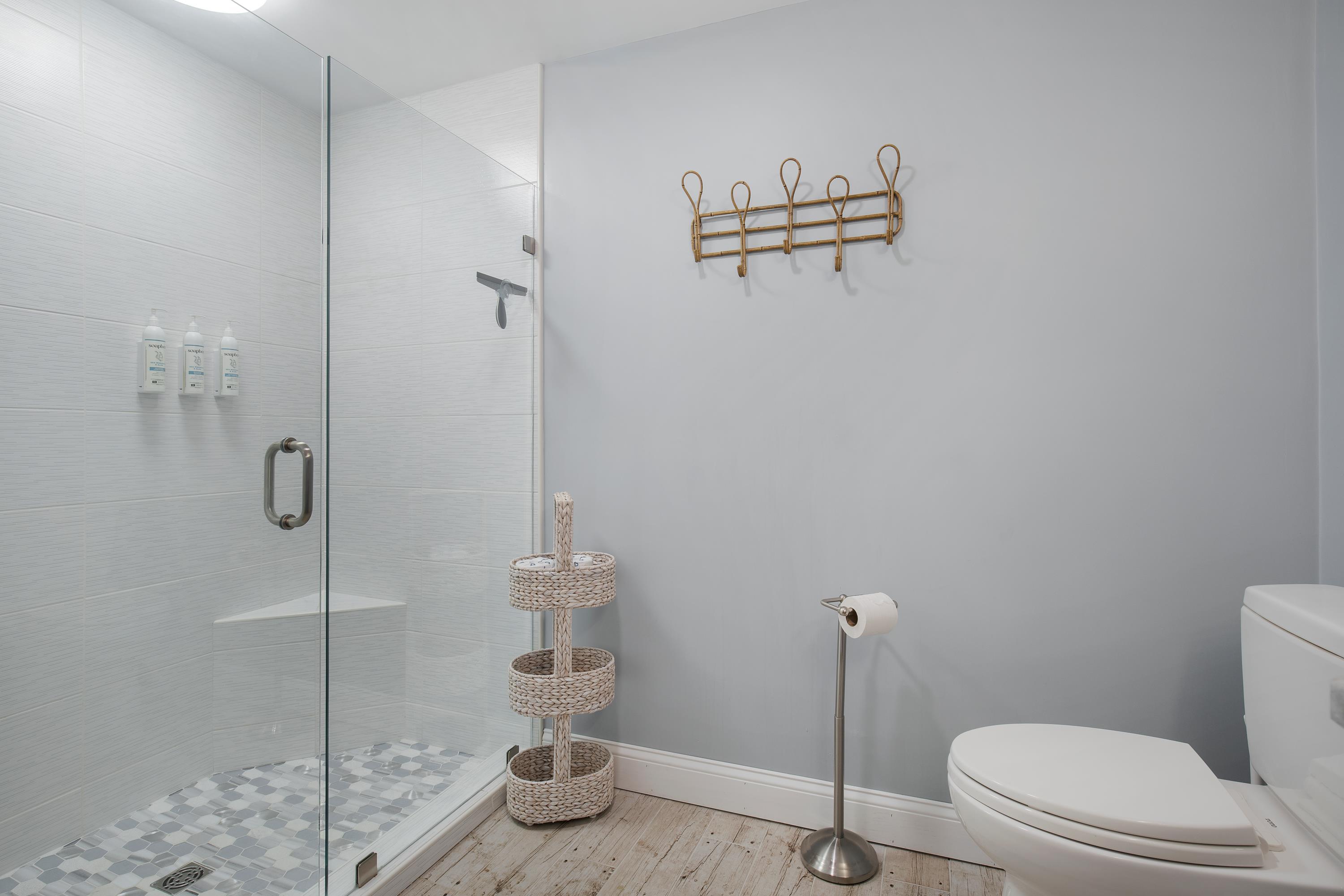 405 Old Wharf Road, Unit B204 Dennis, MA 02639 - Photo 17 of 33 a bathroom with a shower