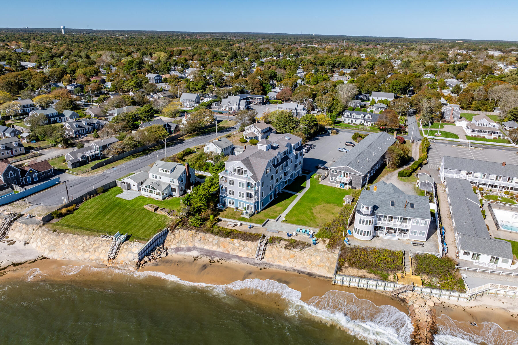 405 Old Wharf Road, Unit B204 Dennis, MA 02639 - Photo 27 of 33 an aerial view of a house with a swimming pool