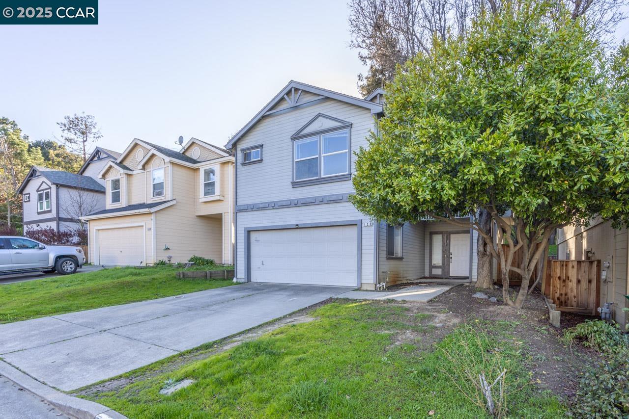120 Bridgeview Court Crockett, CA 94525 - Photo 1 of 21 a view of a house with a yard and large tree