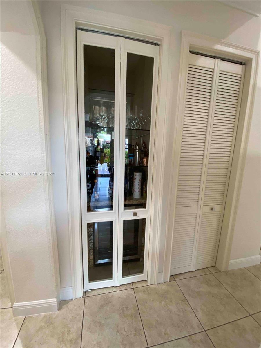 14302 Southwest 15th Street Miami, FL 33184 - Photo 37 of 63 an entryway with a glass door