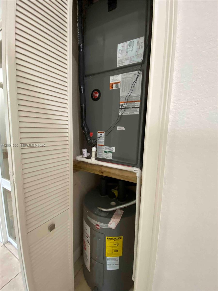 14302 Southwest 15th Street Miami, FL 33184 - Photo 40 of 63 a bathroom with a sink and a mirror