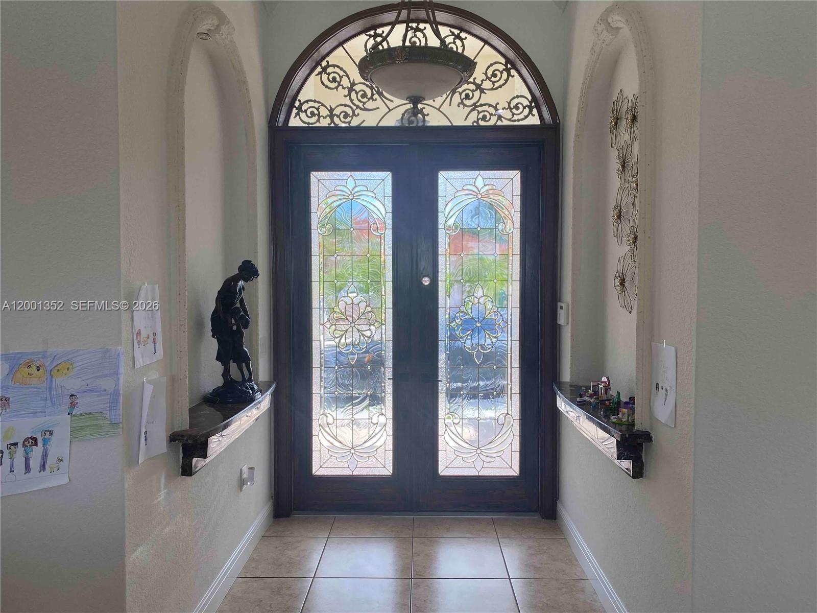 14302 Southwest 15th Street Miami, FL 33184 - Photo 47 of 63 a view of an entryway with a hallway