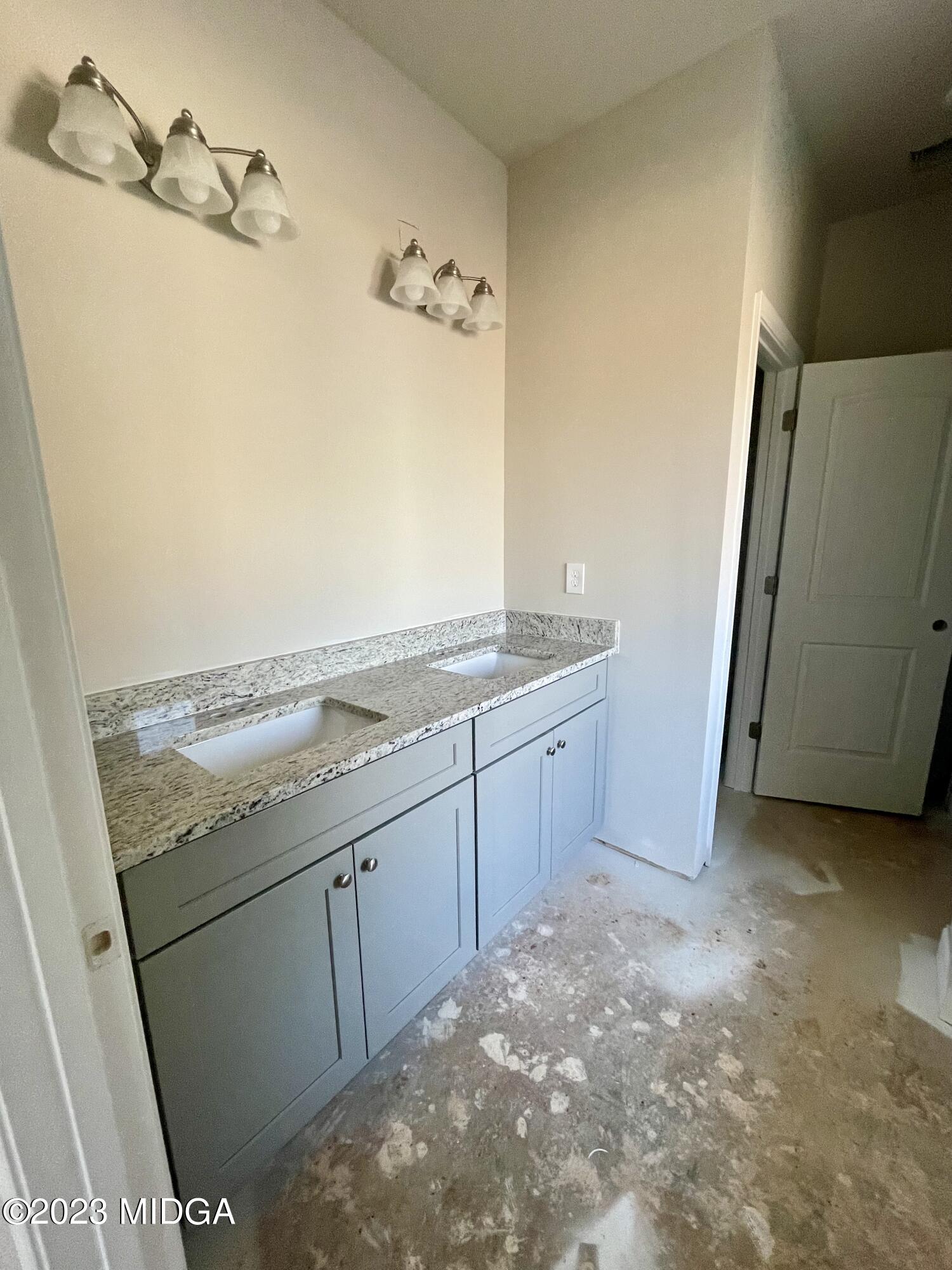 171 Strickland Loop Forsyth, GA 31029 - Photo 4 of 5 a view of a storage & utility room in a kitchen