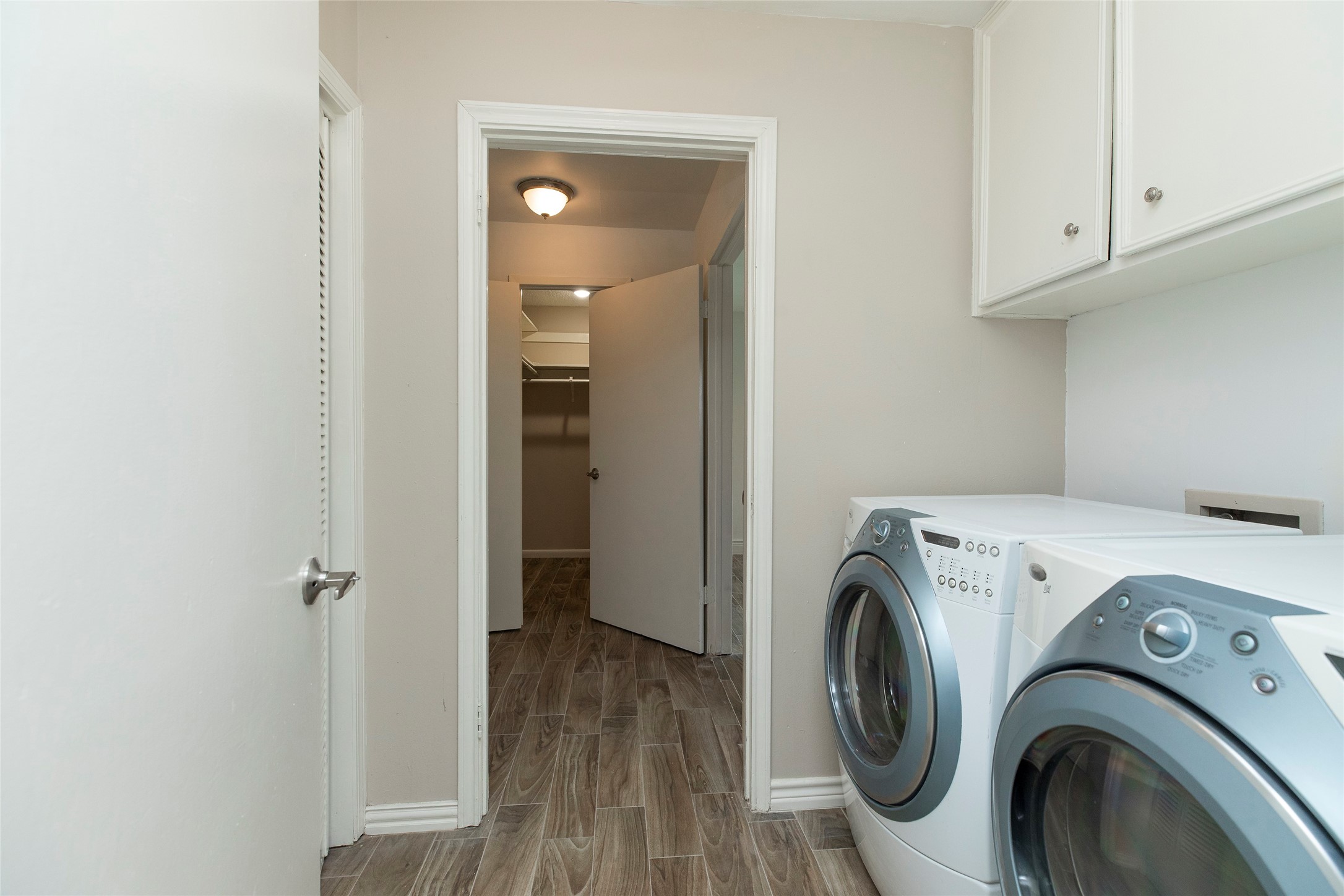 2706 Stetson Lane Houston, TX 77043 - Photo 28 of 46 LAUNDRY ROOM, HOT WATER HEATER IS CONVENIENTLY PLACED HERE, NOT IN ATTIC!