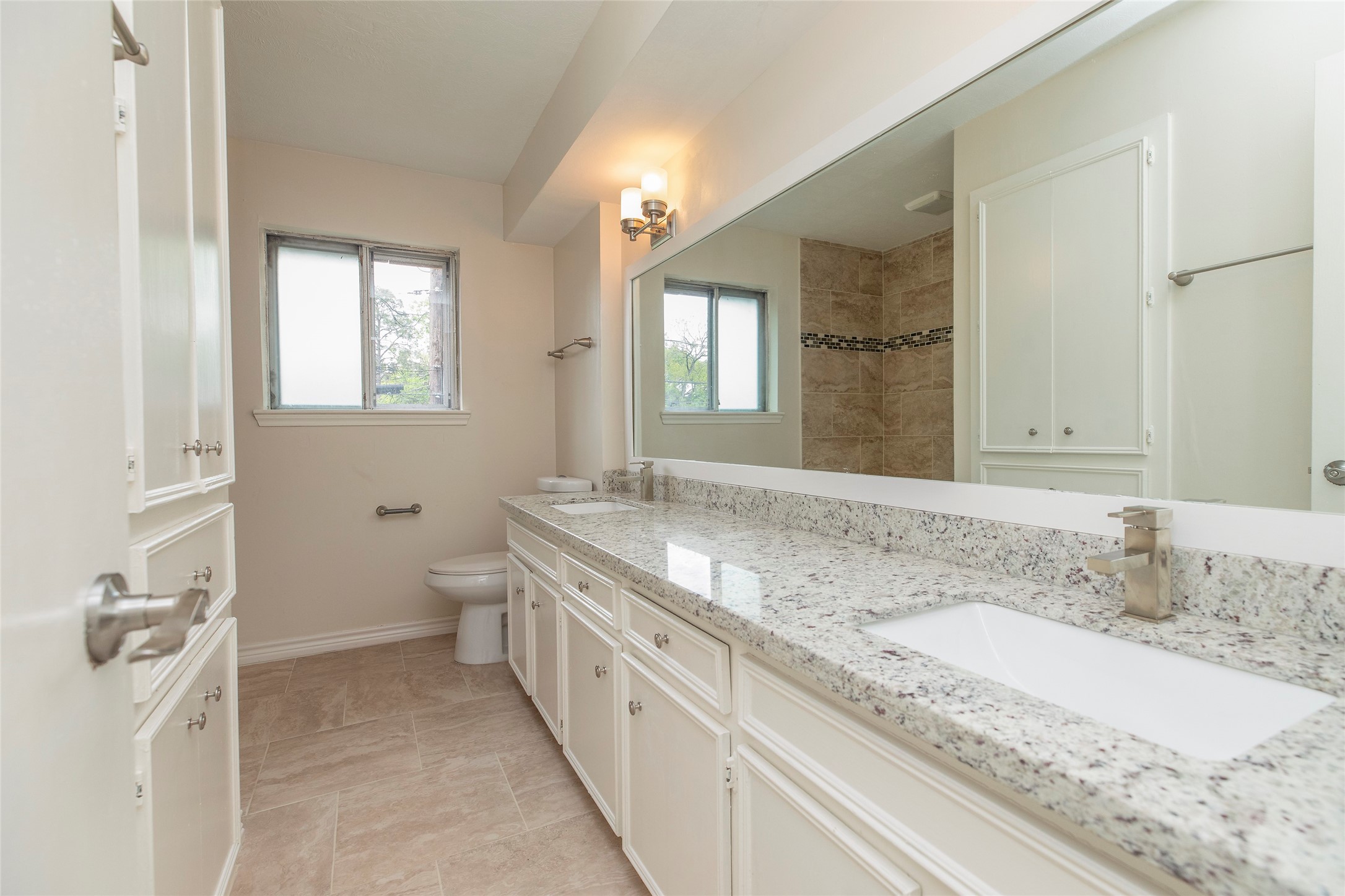 2706 Stetson Lane Houston, TX 77043 - Photo 38 of 46 SECONDARY BATHROOM WITH DOUBLE SINKS