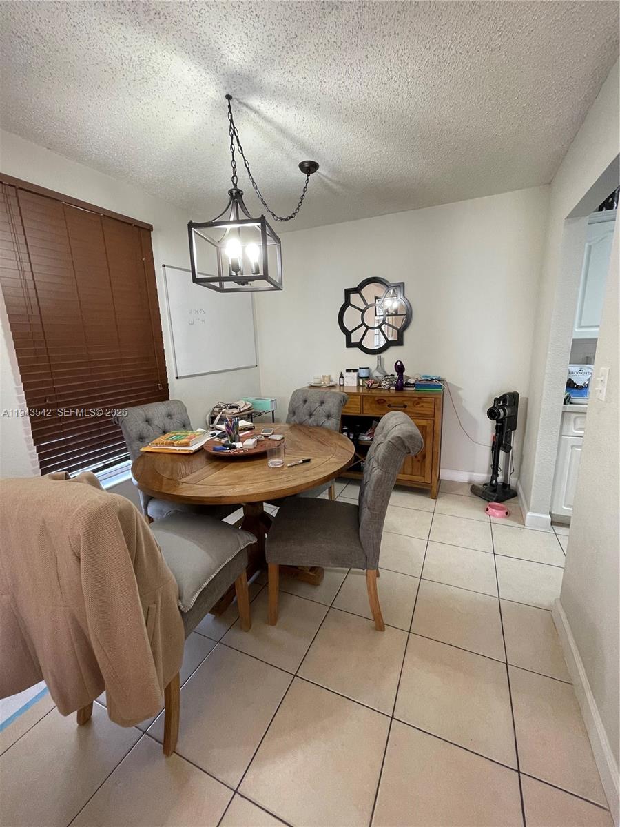 3270 Southwest 7th Street Miami, FL 33135 - Photo 16 of 25 a view of a livingroom with furniture and window