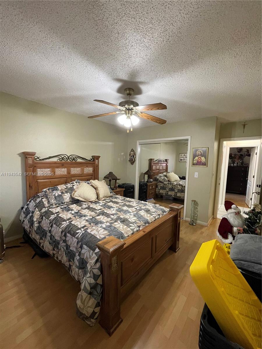 3270 Southwest 7th Street Miami, FL 33135 - Photo 9 of 25 a bedroom with bed and flat tv