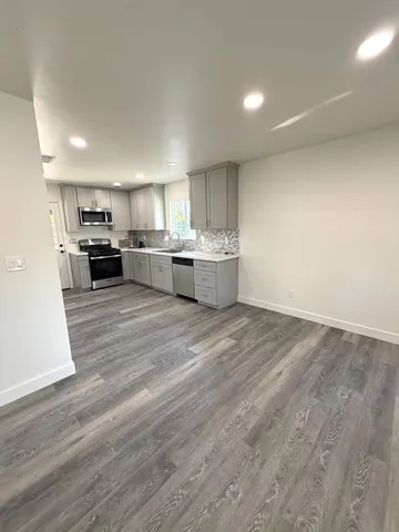 a view of kitchen and microwave