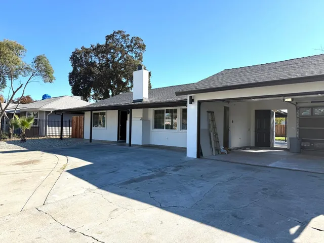 a front view of a house with a porch