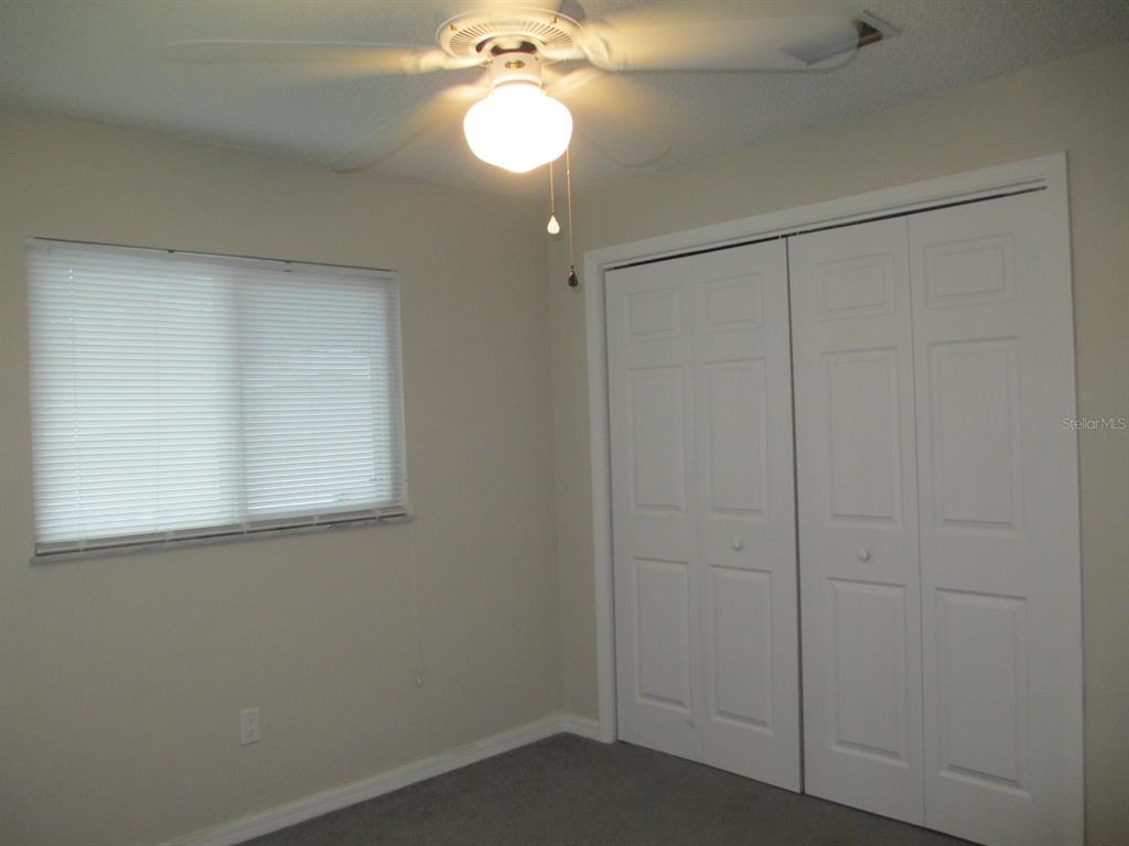 4469 Keyes Avenue Spring Hill, FL 34606 - Photo 22 of 27 an empty room with a window