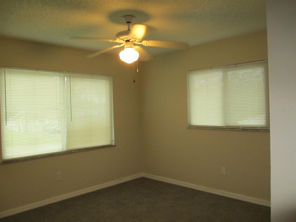 4469 Keyes Avenue Spring Hill, FL 34606 - Photo 23 of 27 a view of a room that has a window