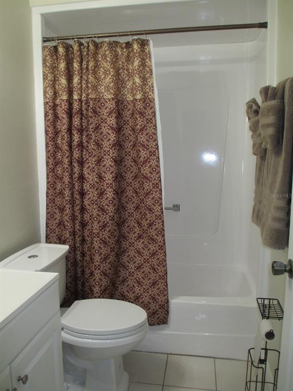 4469 Keyes Avenue Spring Hill, FL 34606 - Photo 25 of 27 a bathroom with a toilet and a shower