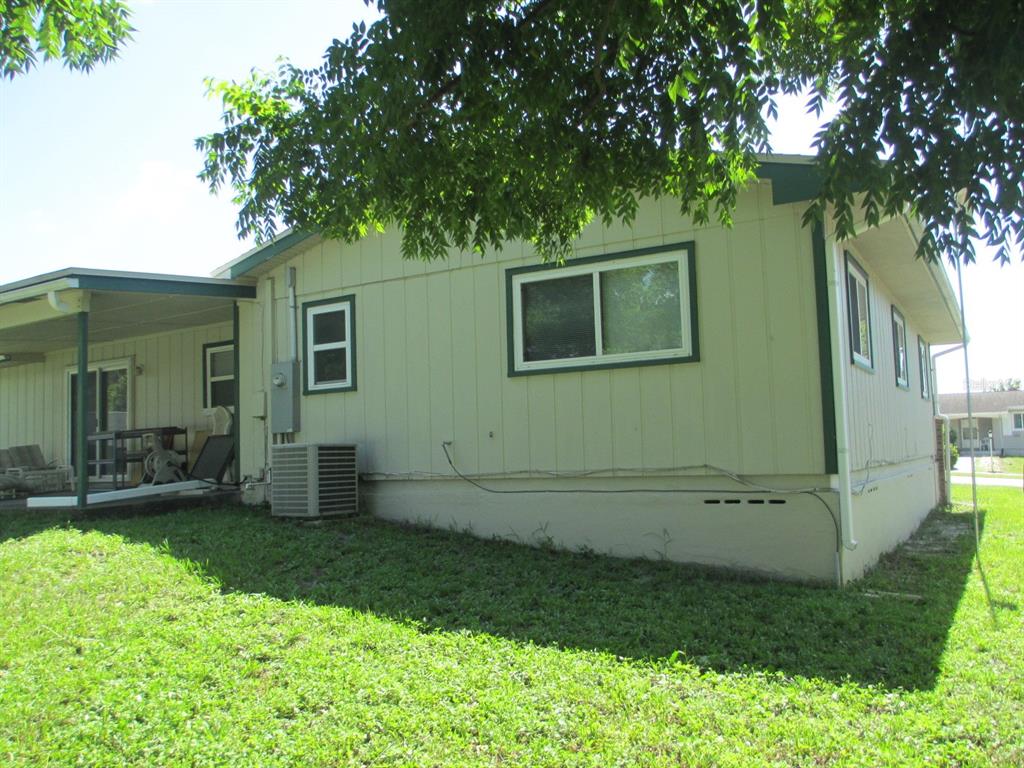 4469 Keyes Avenue Spring Hill, FL 34606 - Photo 4 of 27 a view of a house with a backyard