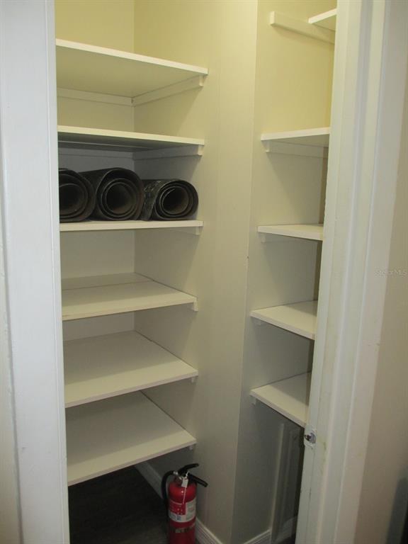 4469 Keyes Avenue Spring Hill, FL 34606 - Photo 9 of 27 a view of walk in closet with empty racks