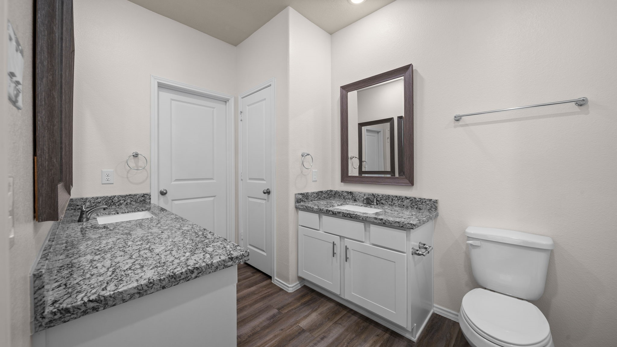 18140 Mail Rte Road Montgomery, TX 77316 - Photo 13 of 26 Primary bathroom featuring dual vanities, granite countertops, and plenty of storage.