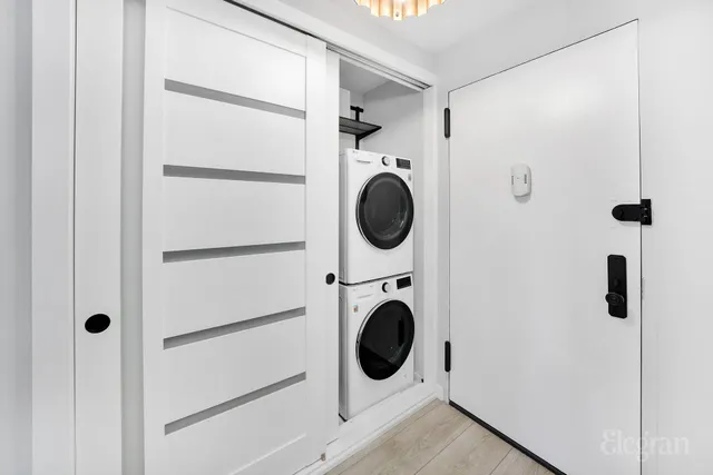 a living room with furniture wooden floor and a flat screen tv