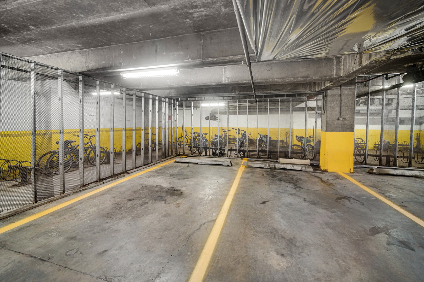 1401 East 55th Street, Unit 313N Chicago, IL 60615 - Photo 14 of 20 a view of a garage with wooden roof
