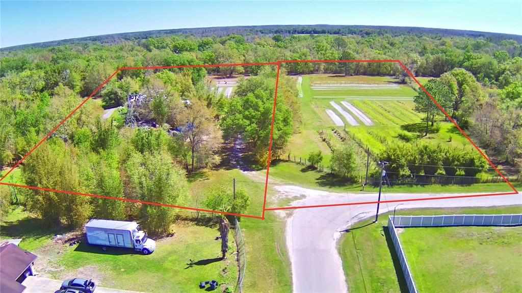 0 Ranchland Drive Lakeland, FL 33809 - Photo 1 of 2 a view of a swimming pool with a yard