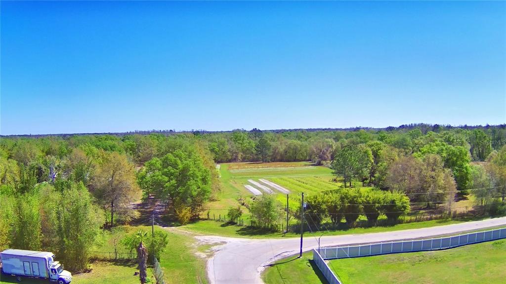 0 Ranchland Drive Lakeland, FL 33809 - Photo 2 of 2 a view of a lake with a yard