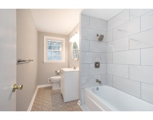 6 Woodmere Road Framingham, MA 01701 - Photo 7 of 15 a bathroom with a bathtub sink and toilet