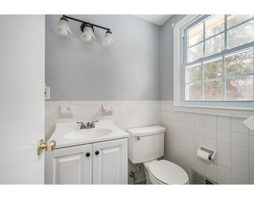 6 Woodmere Road Framingham, MA 01701 - Photo 10 of 15 a bathroom with a sink mirror vanity and toilet
