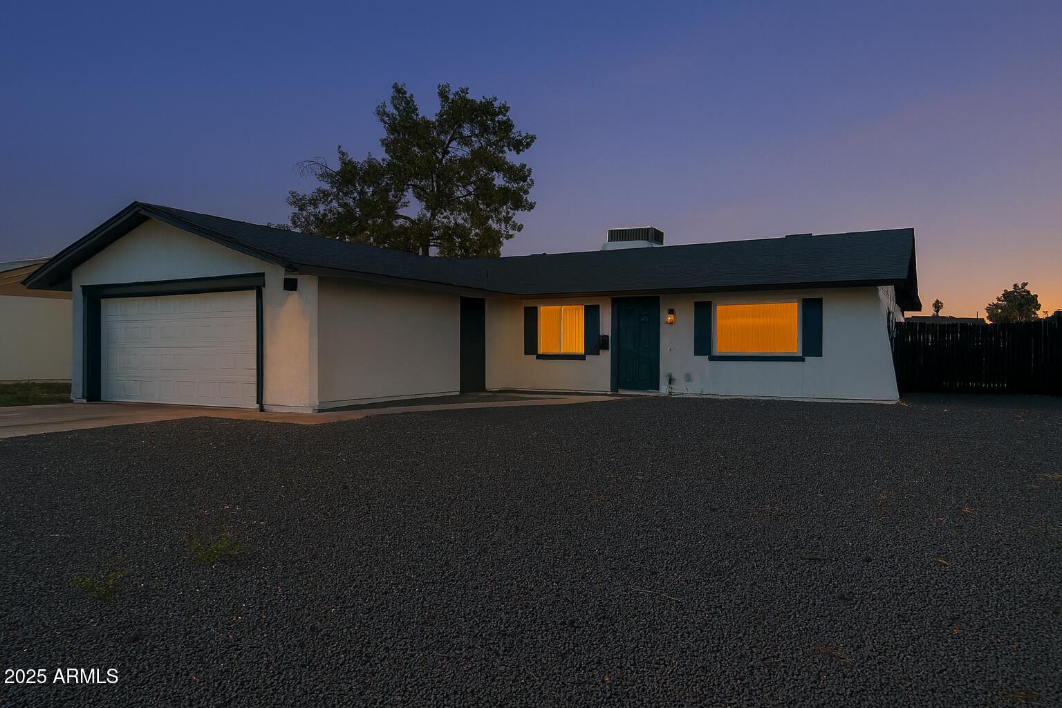 6818 South Terrace Road Tempe, AZ 85283 - Photo 1 of 11 a front view of a house with yard