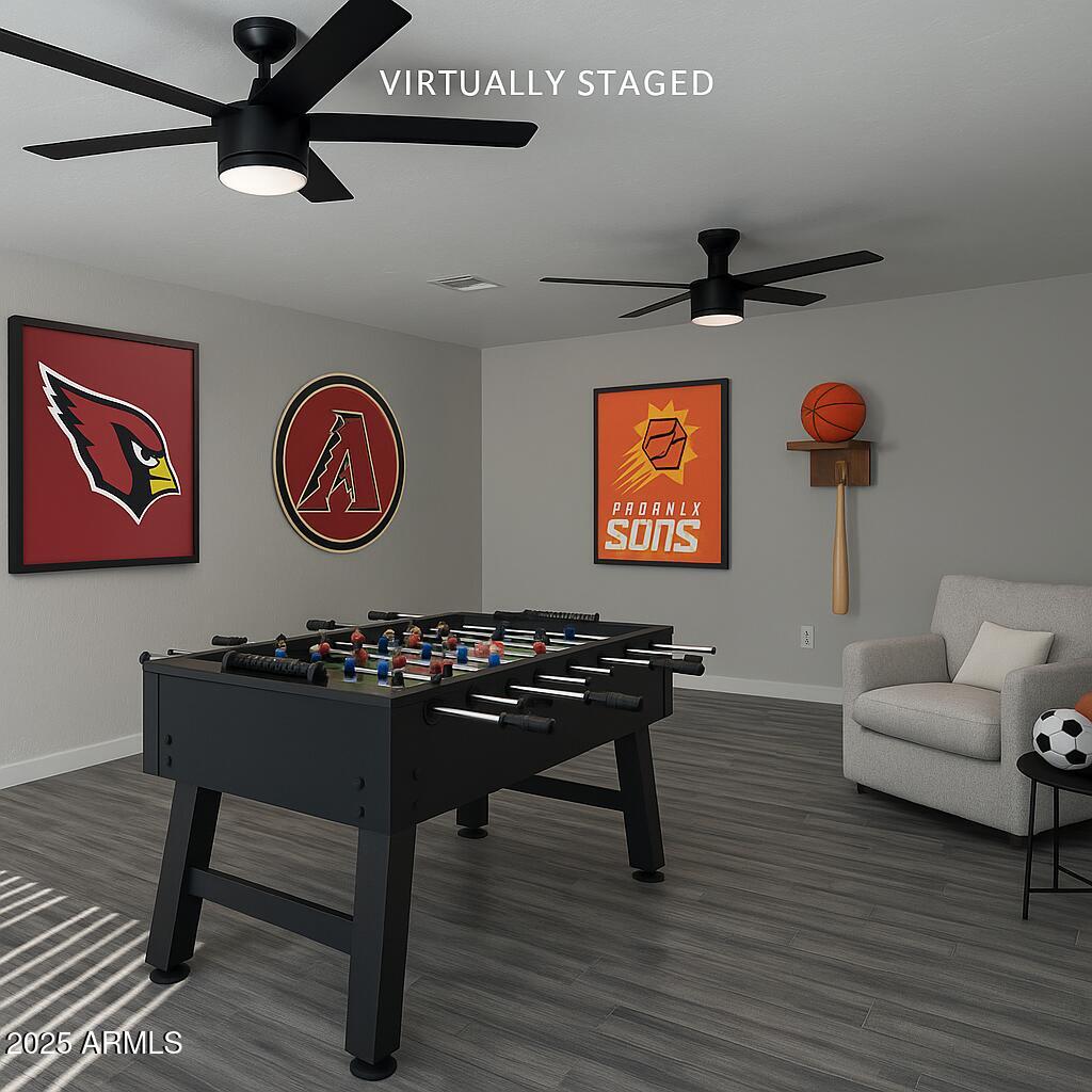 6818 South Terrace Road Tempe, AZ 85283 - Photo 5 of 11 a living room with furniture and wooden floor