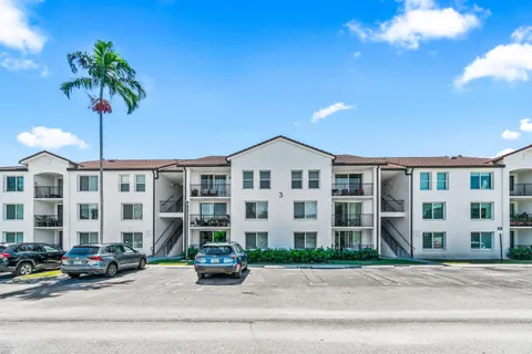 a front view of a building with street view