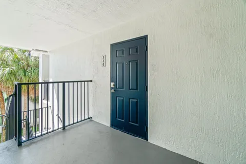a view of a porch with a door