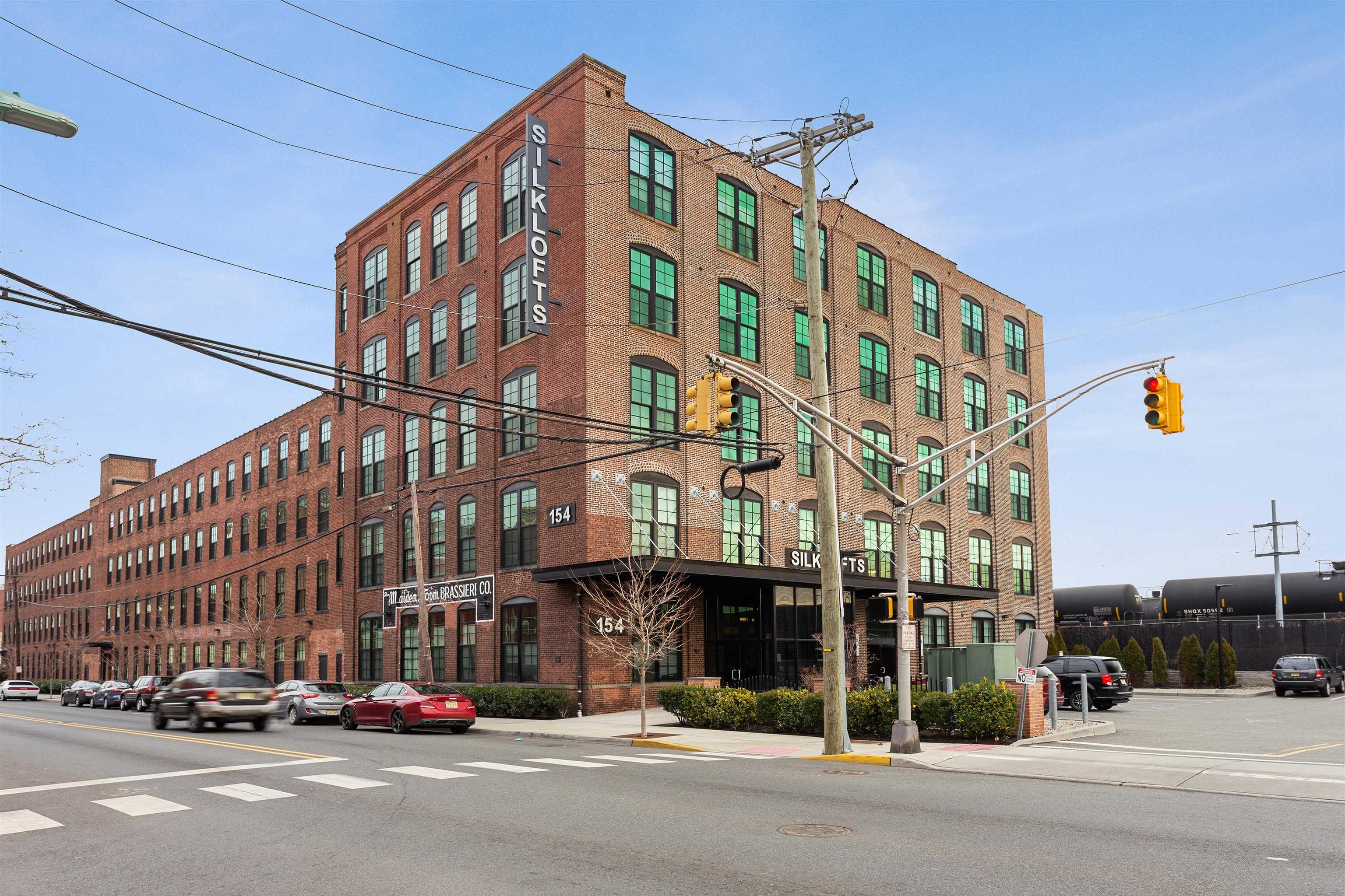 154 Ave East, Unit A501 Bayonne, NJ 07002 - Photo 19 of 19 a view of a building and a street