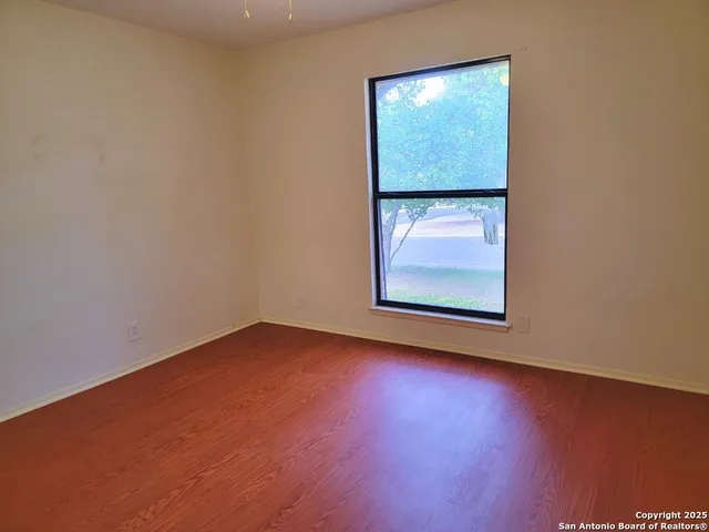 an empty room with window