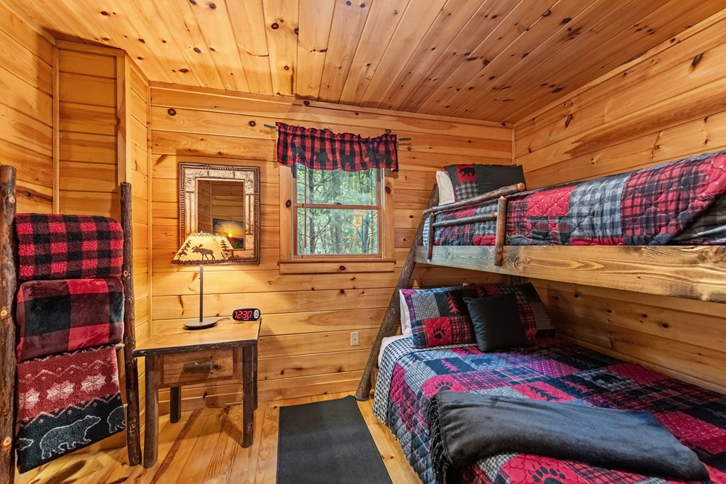 77 Old Covered Bridge Road Cherry Log, GA 30522 - Photo 39 of 96 Lower level bedroom with bunks