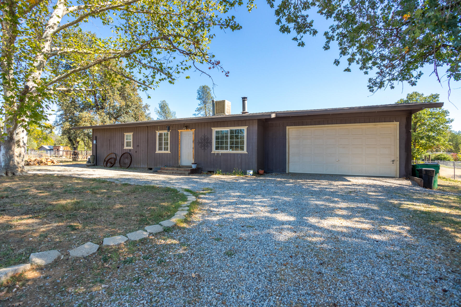 12141 Cinder Road Redding, CA 96003 - Photo 1 of 23 a view of a house with a yard