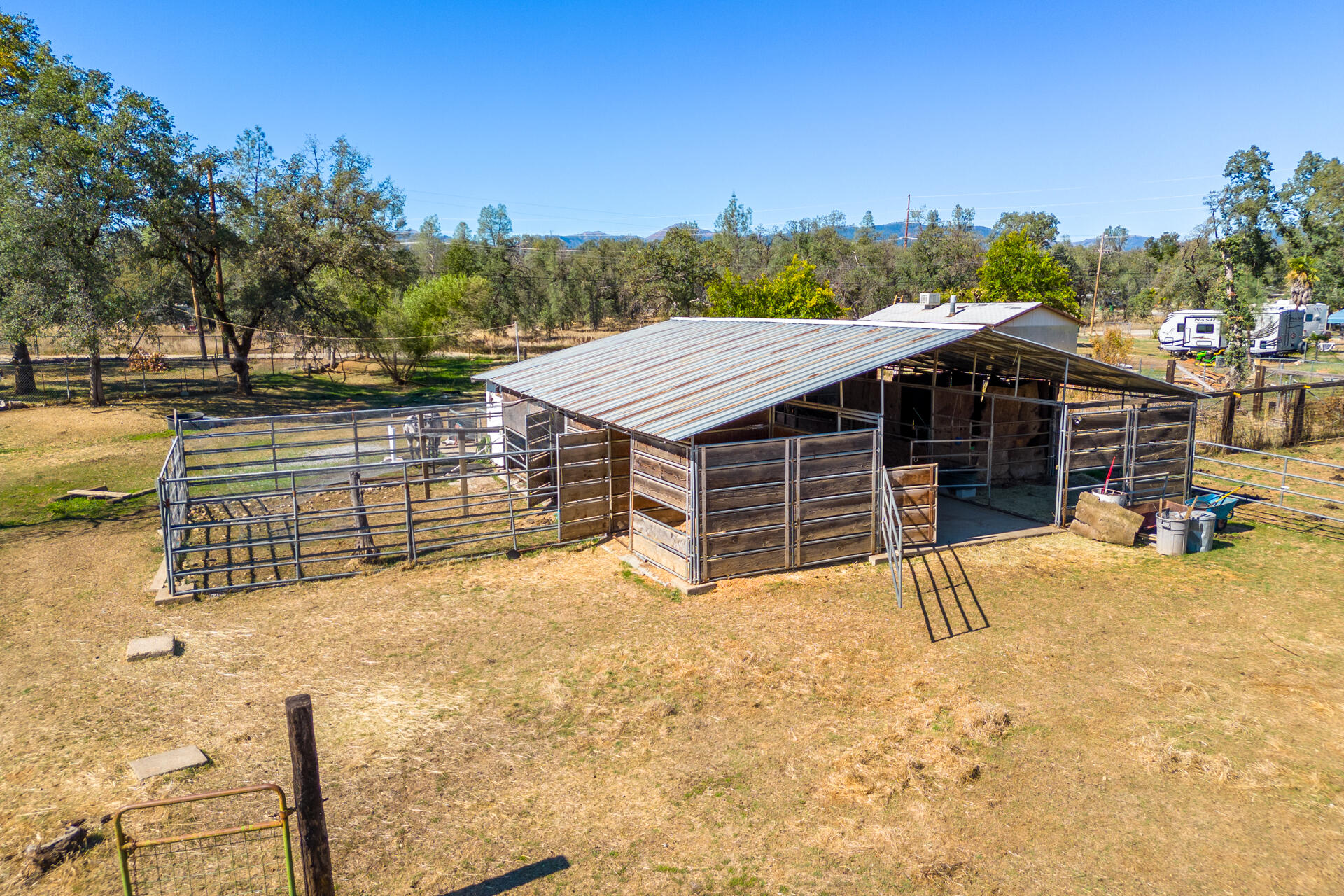 12141 Cinder Road Redding, CA 96003 - Photo 19 of 23 a view of a house with a outdoor space